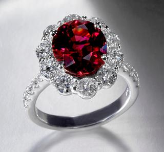 14 kt White Gold Garnet and Diamond Halo Ring